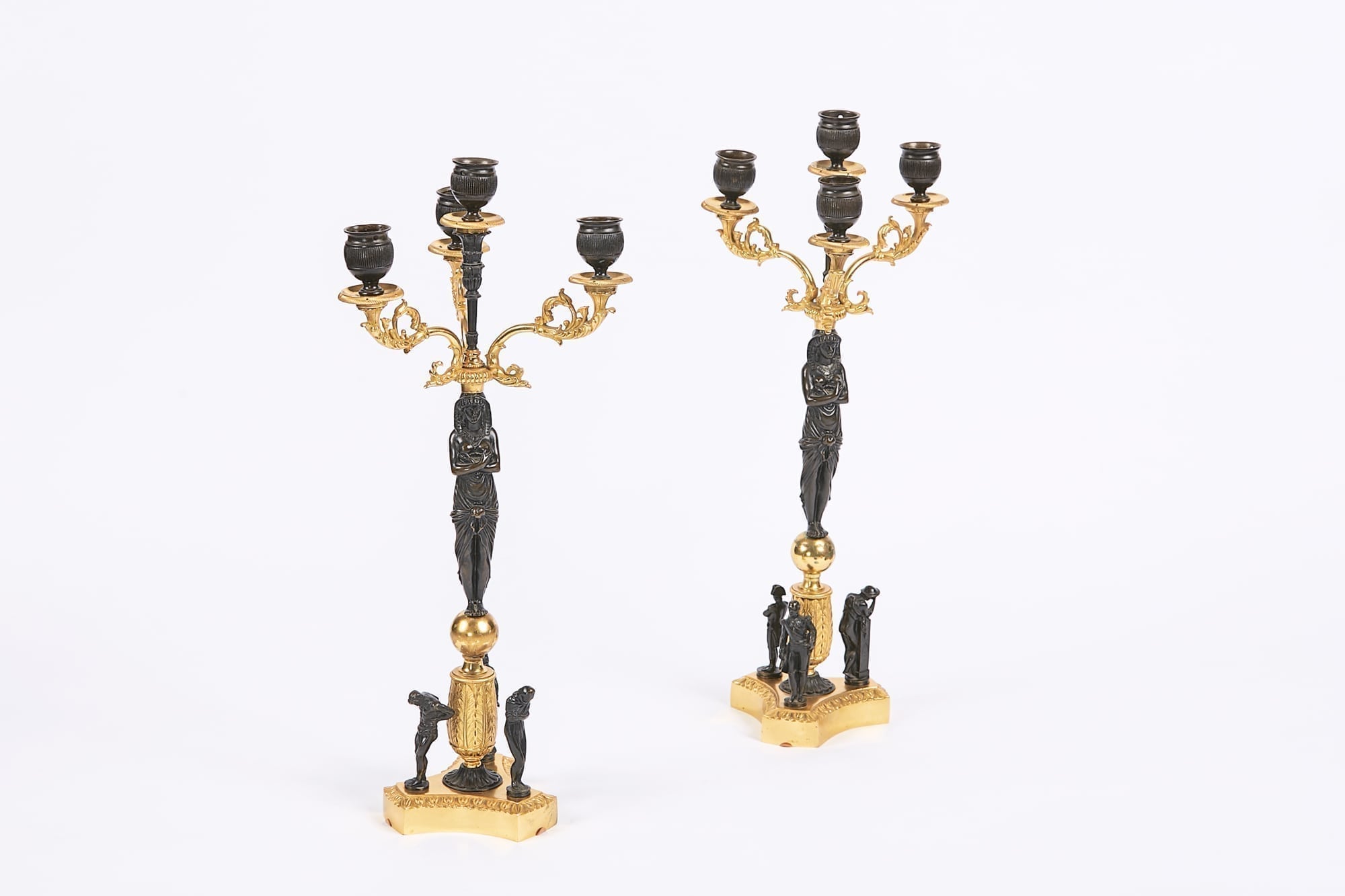 A Pair of French Empire Gilt Bronze Candle Sticks